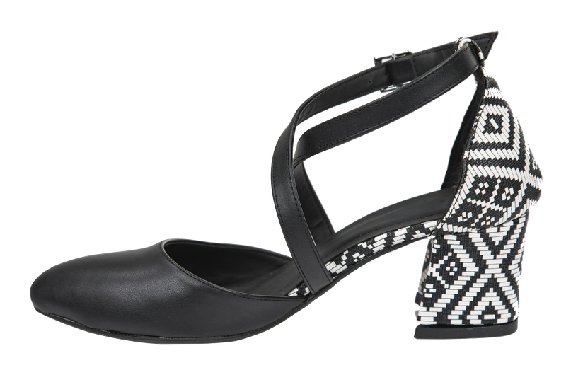 A black shoe with a woven geometric block heel.